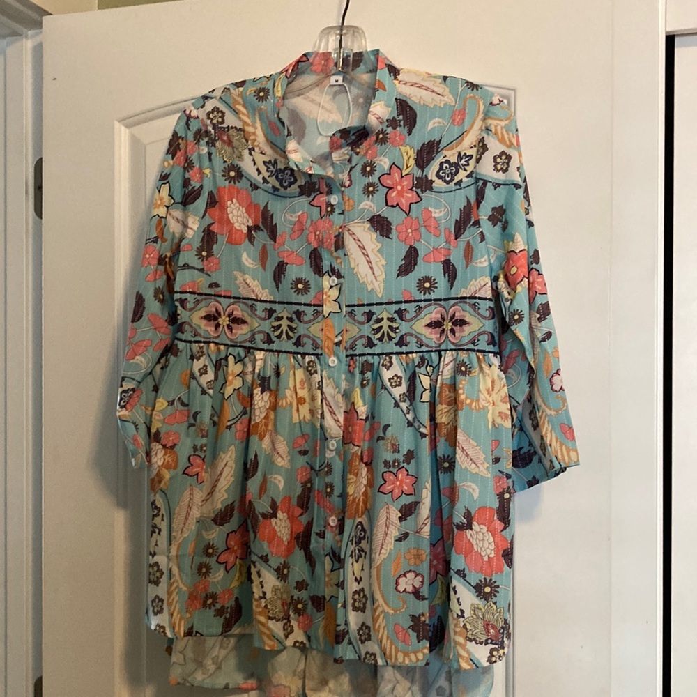 Blouse never worn.